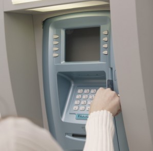 Woman Using Atm Machine Woman Using Atm Machine